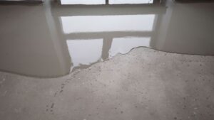 Commercial floor with water on it from flooding
